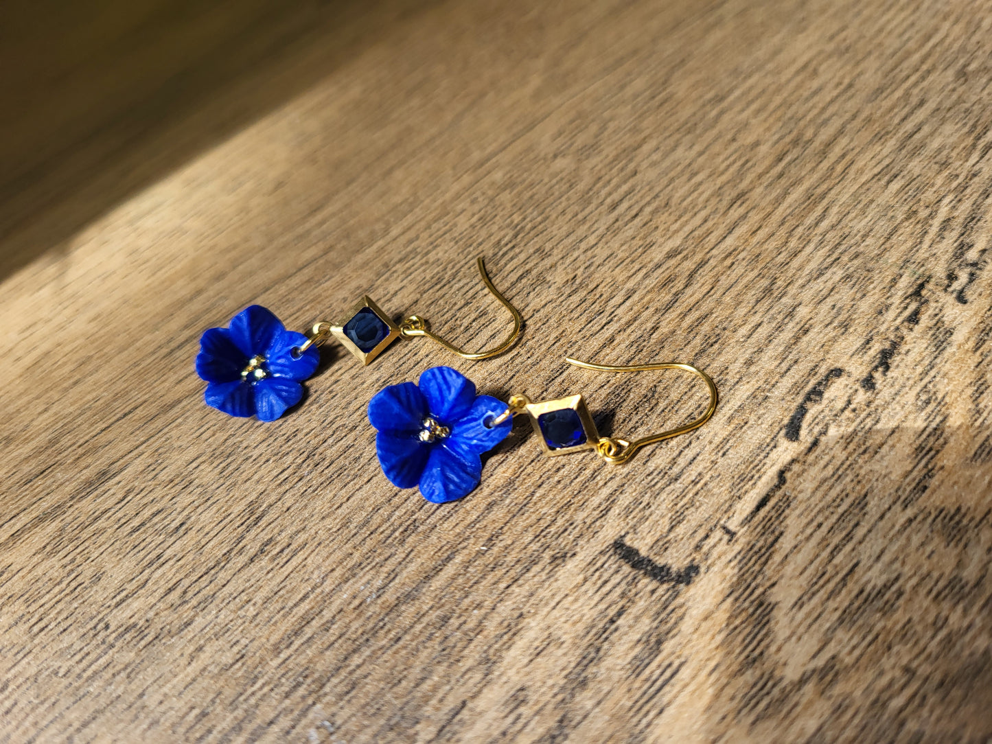 Blue and gold flower earrings