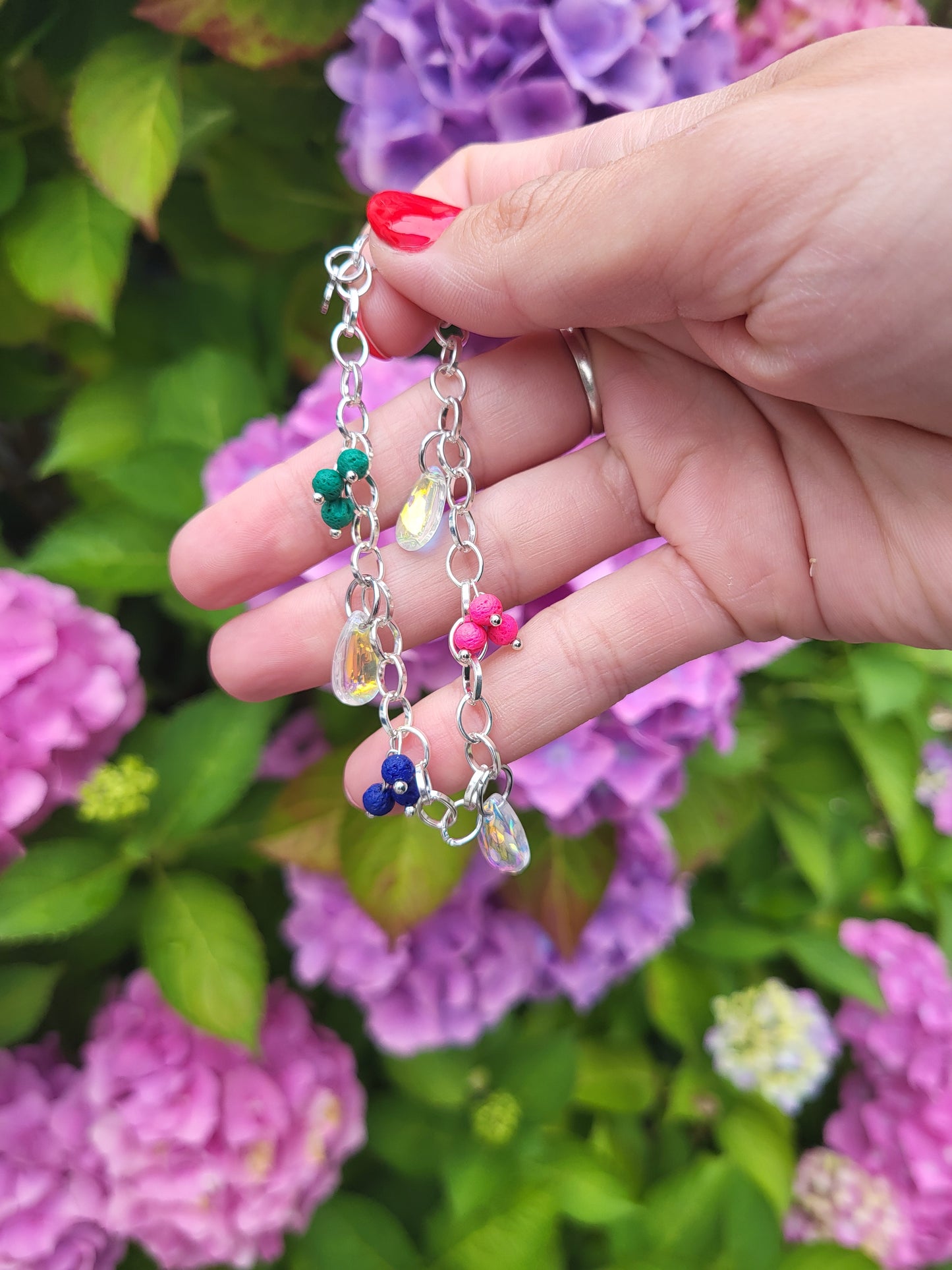Chunky silver bracelet with colourful charms
