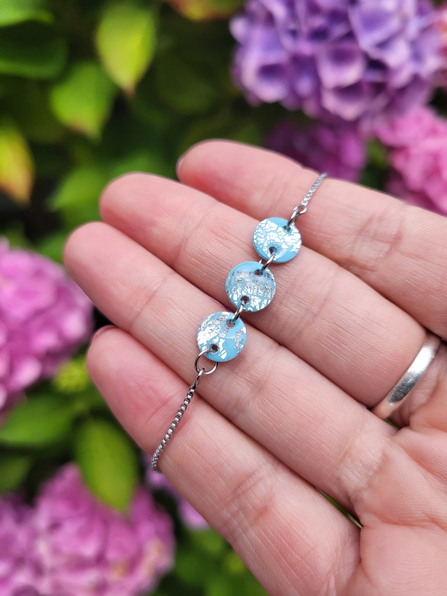 Light blue and silver adjustable bracelet