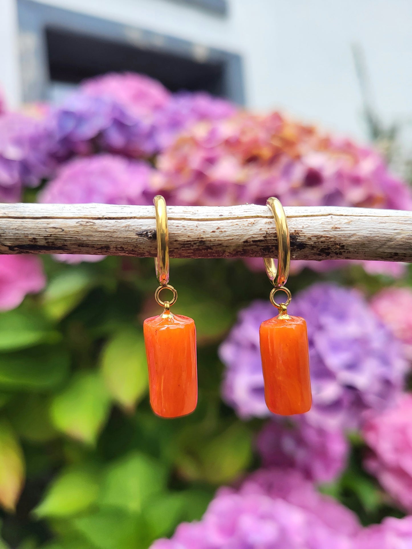 Orange and gold hugging hoop earrings