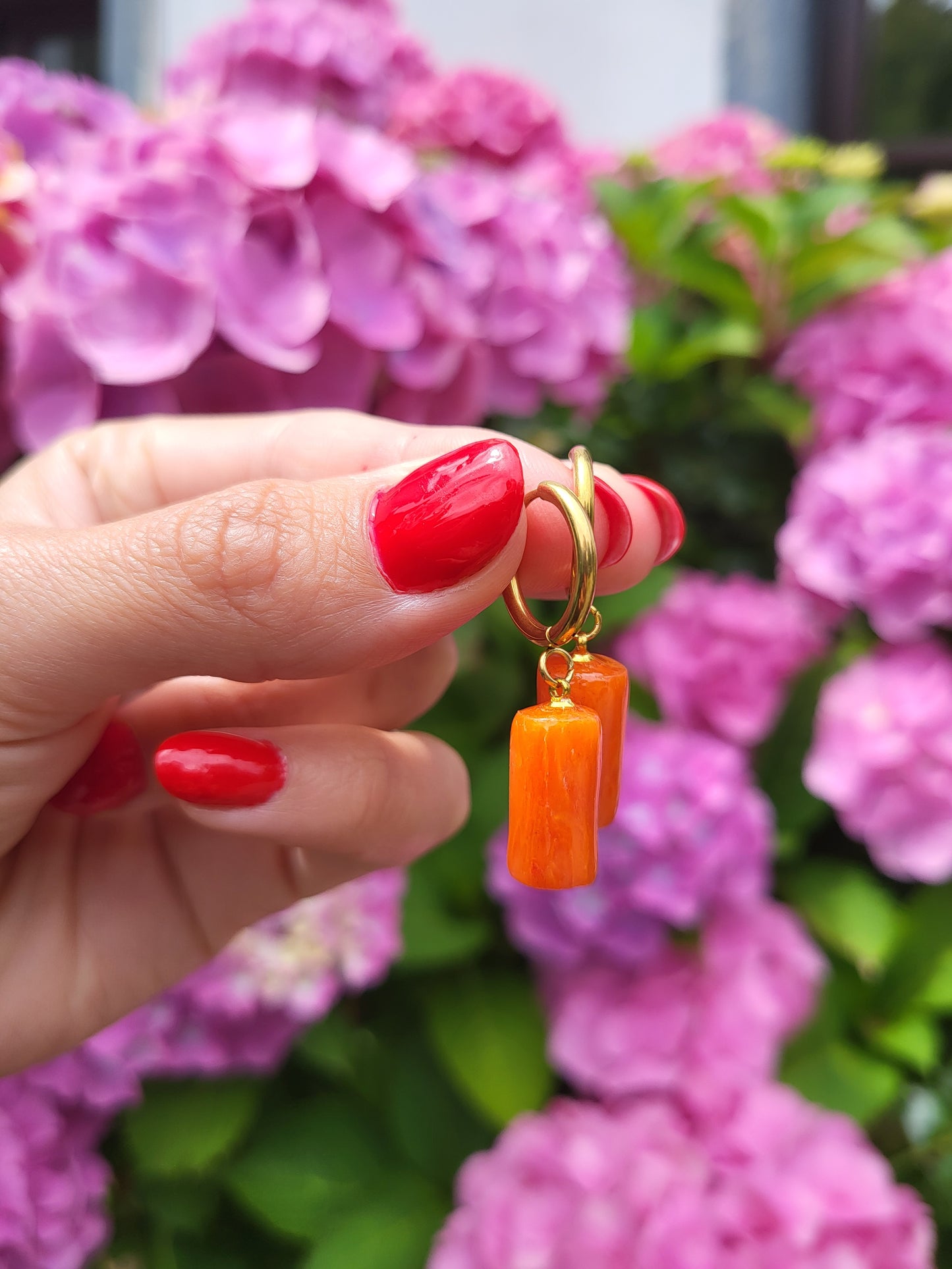 Orange and gold hugging hoop earrings