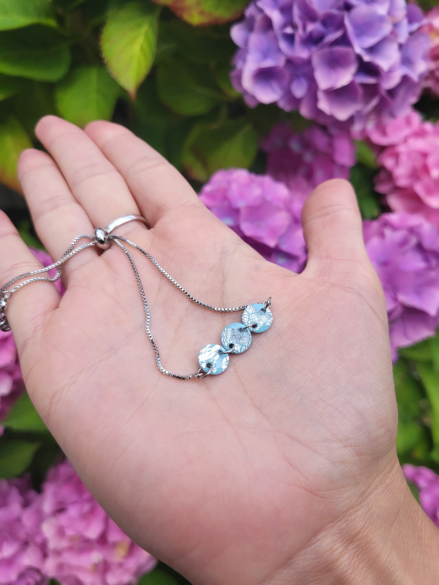 Light blue and silver adjustable bracelet
