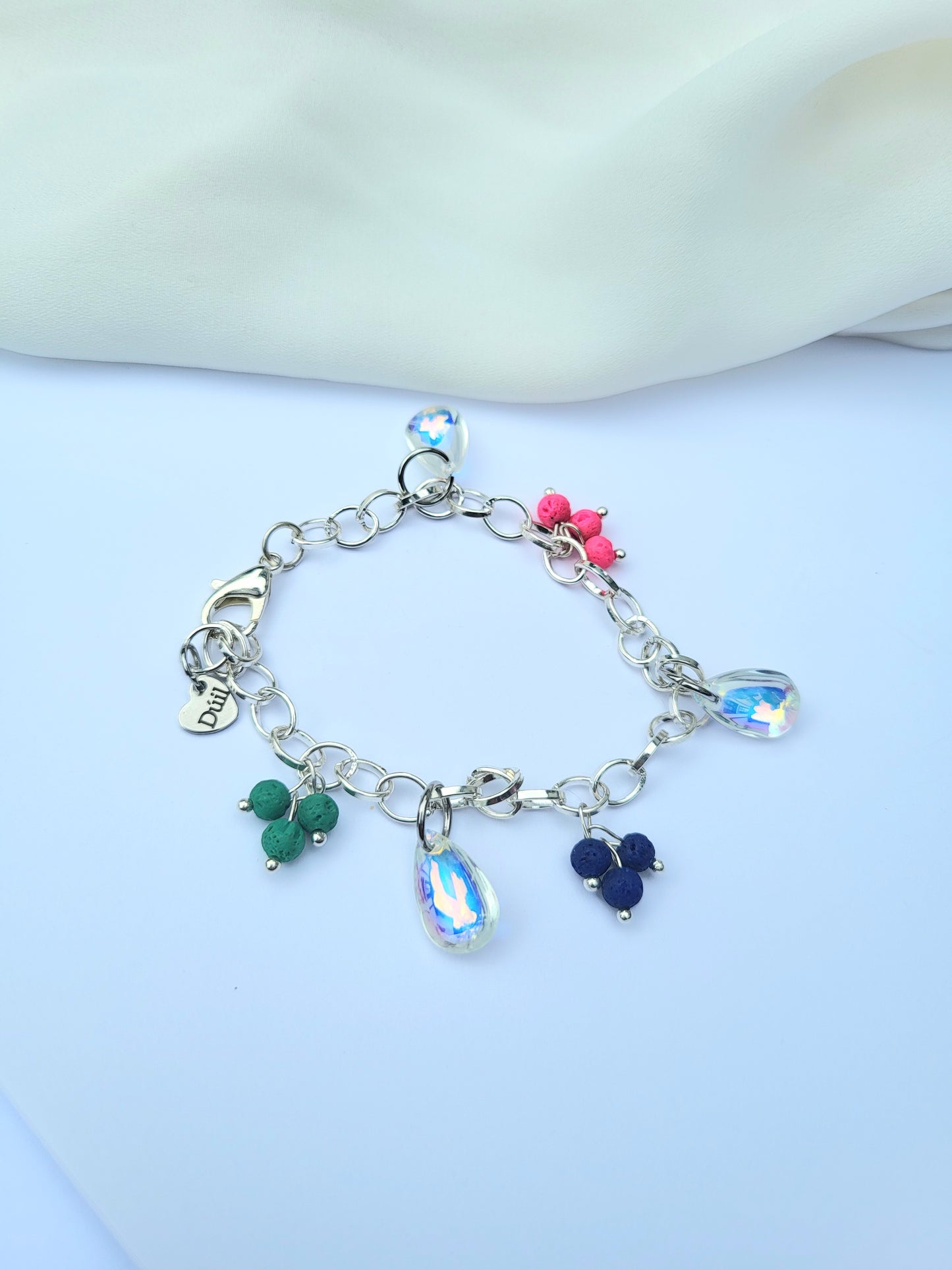 Chunky silver bracelet with colourful charms