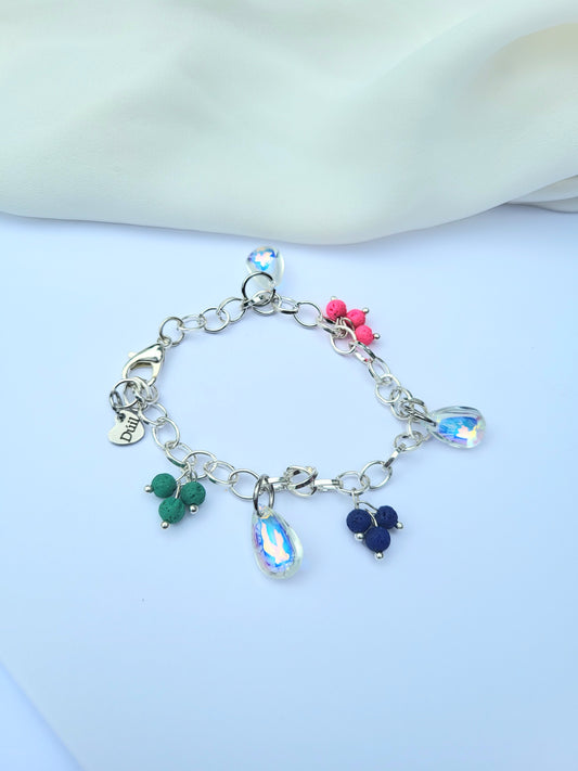 Chunky silver bracelet with colourful charms