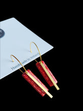 Load image into Gallery viewer, Red &amp; gold sparkle dangling hoop earrings - Dúil
