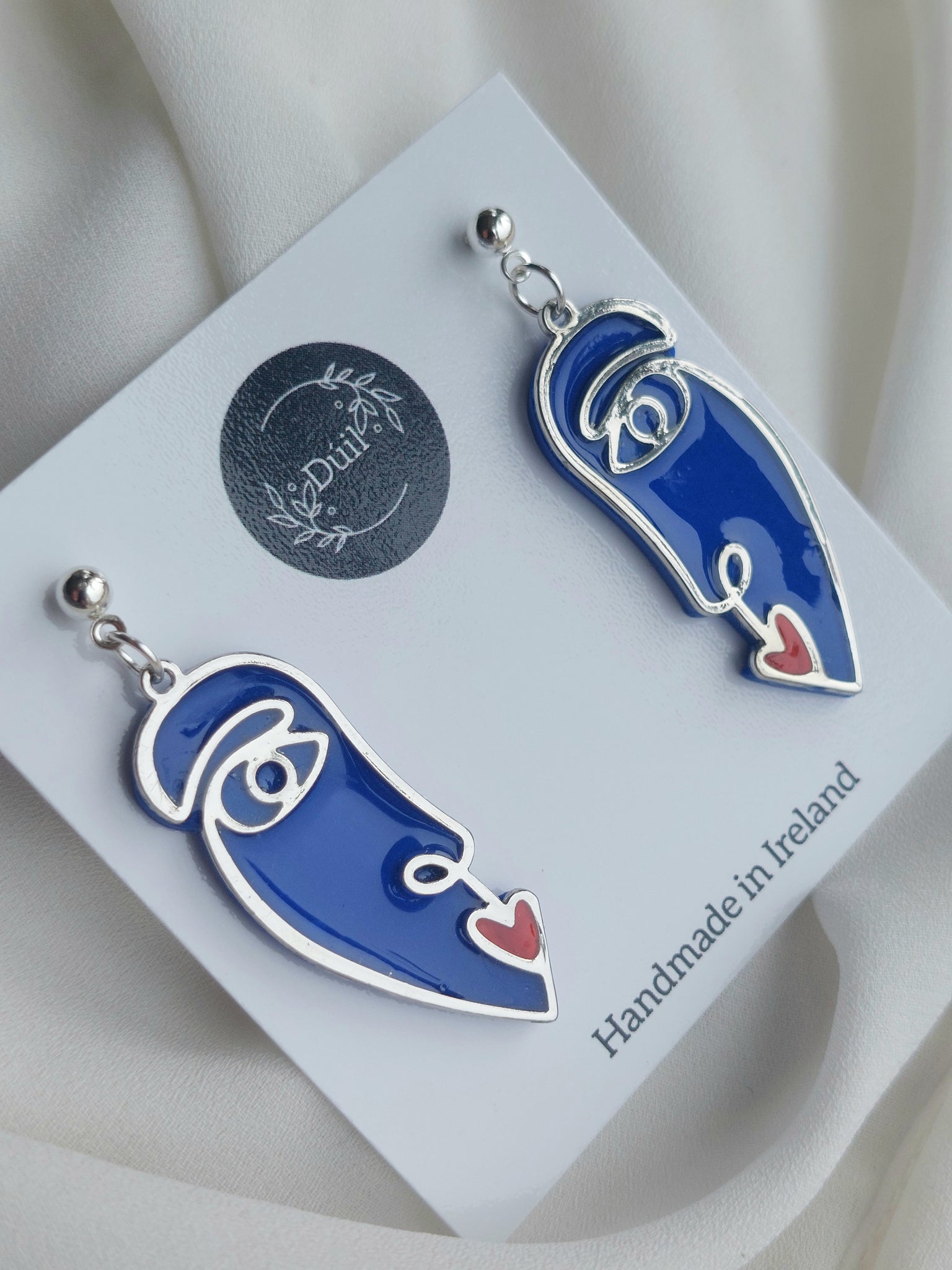 Duil Silver blue red abstract face earrings